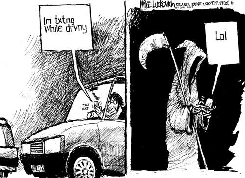 texting-while-driving.jpg Texting while driving image by amhirschman