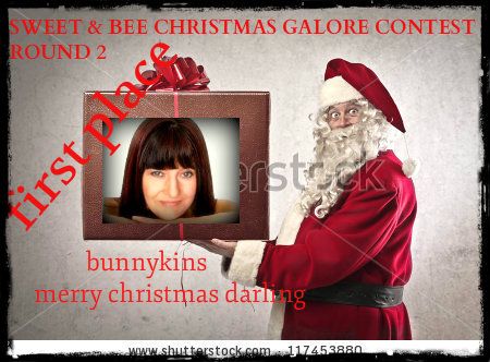 photo stock-photo-santa-claus-holding-a-present-117453880-2_zps729c900d.jpg